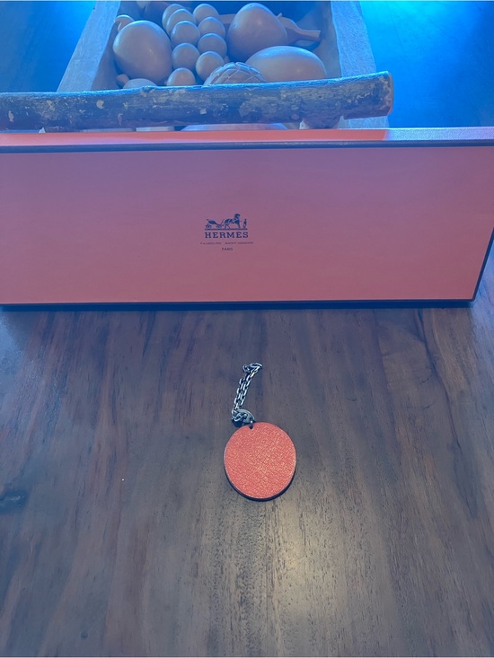 Hermes Accessories - Hermes Orange Round Leather Key chain or purse charm.Chain 9.25 silver chain
